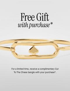 Gold bangle bracelet with heart charm detail, offered as free gift with purchase.