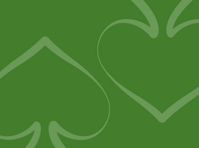 a green background with a green and white pattern of hearts