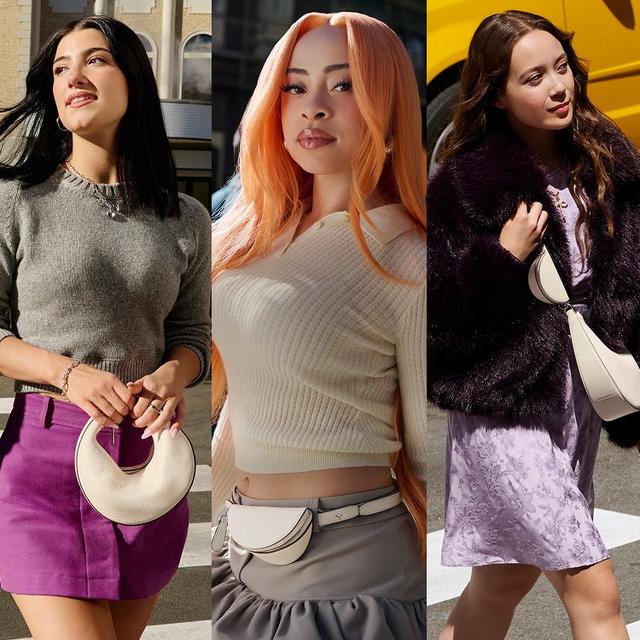 three women are walking down the street in different outfits