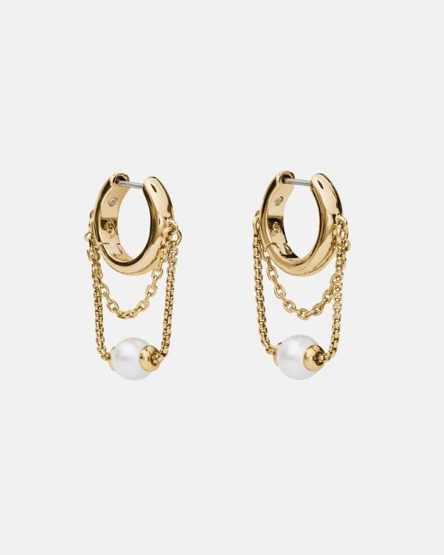 Gold hoop earrings with delicate chains suspending white pearls.