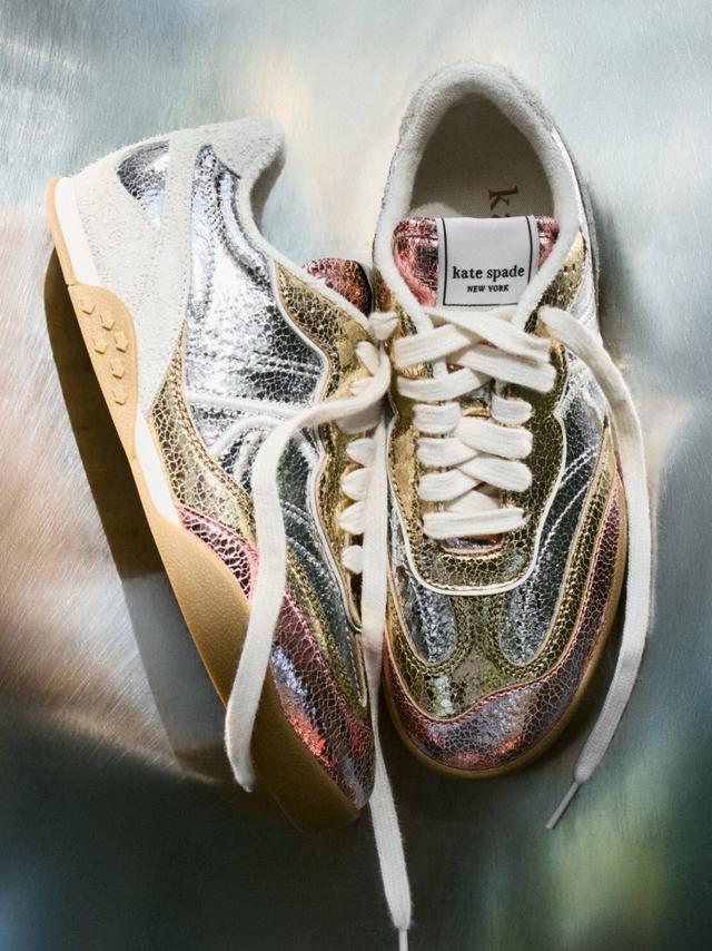 Kate Spade New York sneakers with metallic multicolor textured upper and white laces.