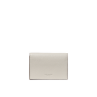 Metallic silver leather card holder with minimalist design.