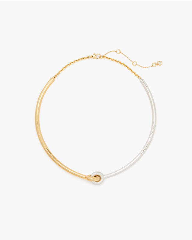a gold and silver necklace with a gold clasp and a gold chain