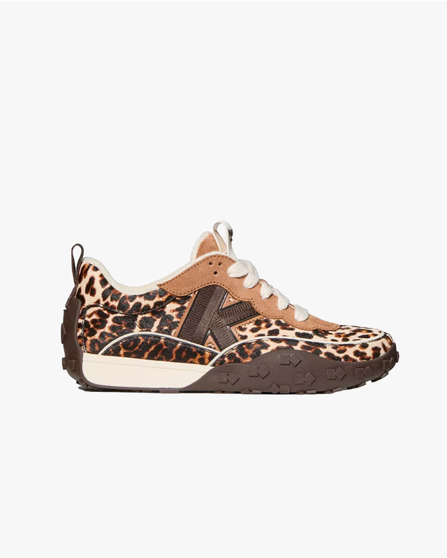 a pair of sneakers with leopard print on the side