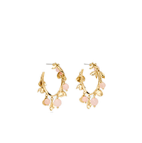 Gold hoop earrings with dangling star charms.