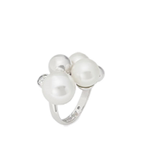 Silver ring featuring three lustrous white pearls in varying sizes arranged in a modern cluster design.