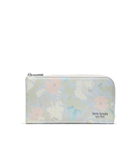 Kate Spade iridescent wallet with zip closure and brand logo.