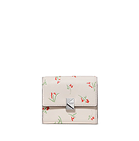 Small cream-colored wallet with pink floral pattern and snap closure.