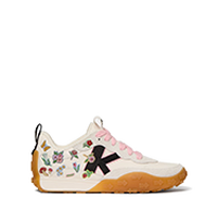 Sneaker with floral print and black star design, featuring a pull tab and tan rubber sole.