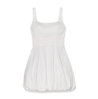 White sleeveless dress with gathered bubble hem and spaghetti straps.