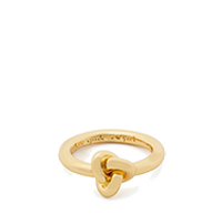 Gold ring with a small heart-shaped charm featuring a lock design.