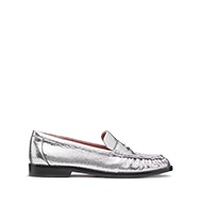 Silver metallic penny loafer with moc-toe stitching and a low heel.